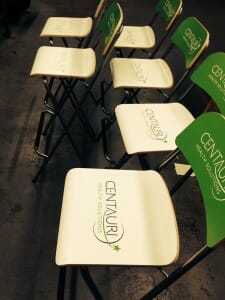 Yes, these are custom-branded chairs. The logo is printed on an adhesive, which is then plastered to the chair.